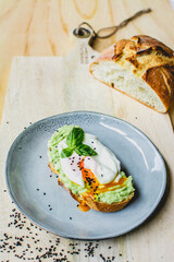 Slice of bread with avocado and coriander  