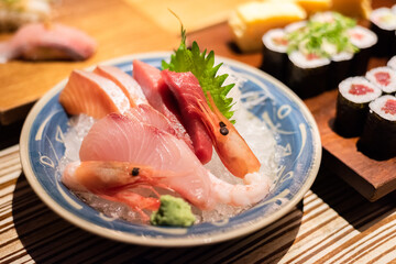 sashimi seafood on plate at restaurant