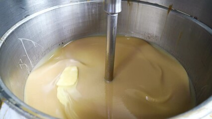 knead mass for Turkish delight. confectionery factory sweets production