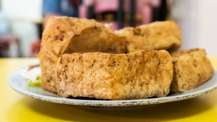 snack of stinky tofu on the table