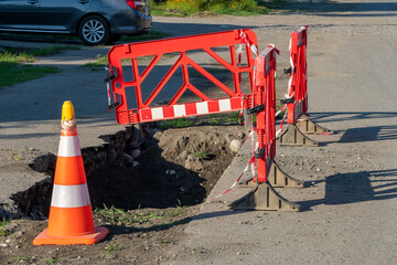 Traffic barriers surrounding street construction site