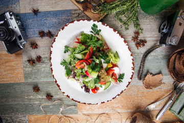 Healthy rustic garden salad of fresh vegetables