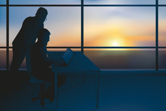 Concept du travail d&rsquo;&eacute;quipe en entreprise avec deux collaborateurs qui partagent des informations et mettent leurs comp&eacute;tences en commun sur un projet.