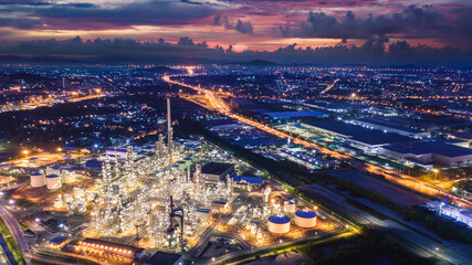 Fototapeta na wymiar refinery industry zone at night and lighting cityscape