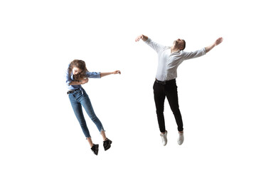 Mid-air beauty cought in moment. Full length shot of attractive young woman and man hovering in air and keeping eyes closed. Levitating in free falling, lack of gravity. Freedom, emotions, artwork