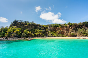 The Beautiful view of Sancho Beach from the sea, with turquoise clear water, at Fernando de Noronha Marine National Park, a Unesco World Heritage site, Pernambuco, Brazil