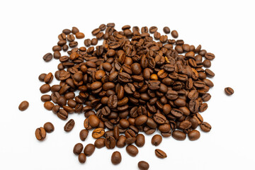 Roasted coffee beans pile isolated on white background. top view