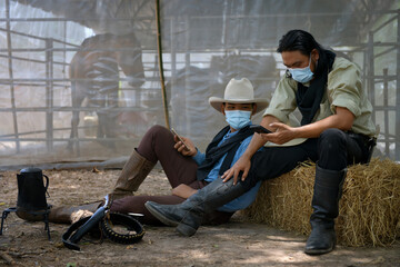 Two cowboy men Wear a mask to prevent the spread of the disease. Covid 19, Quarantine Concept