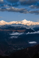 Fototapeta na wymiar Sunrise at Snow Mountain Meili, a sacred mountain in Tibet, China.