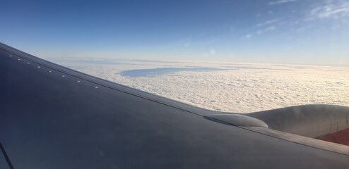 Airplane  window view with beautiful sky.