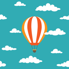 Obraz premium Orange hot air balloon flying in the powder blue sky with clouds.