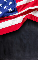 Fototapeta na wymiar USA flag, US of America sign symbol on black board, copy space