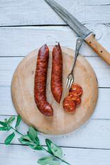 Traditional Spanish chorizo on kitchen board