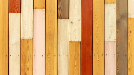 boards made of different types of wood arranged vertically