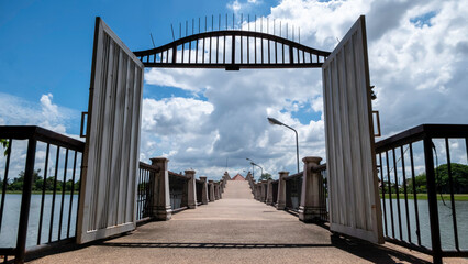 The bridge that crosses the swamp in the park.