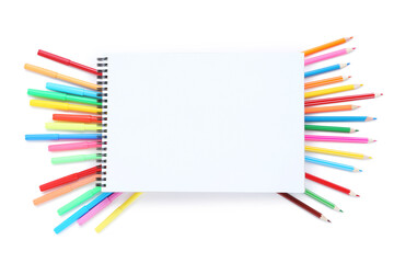 Fototapeta premium Colorful pencils and felt-tip pens with blank sheet of paper on white background