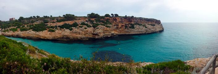 Rocky coast and bay with turquoise water in Majorca, Spain