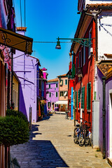 Fototapeta na wymiar Colorful street in Burano near venice, Italy