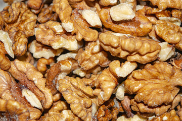 Peeled walnuts close-up. Surface texture. Healthy diet.