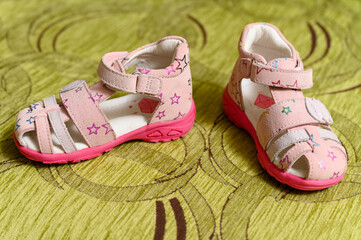 Summer baby shoe with stars.