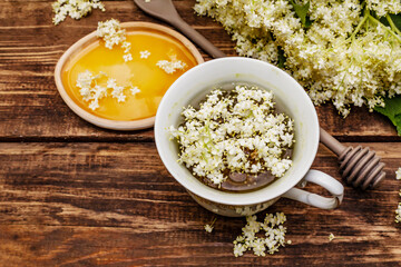 Tea from fresh elder flowers. Hot drink, honey, alternative medicine
