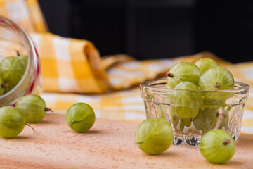 Sweet and sour green cherry-plums. Fruits in a glassware.