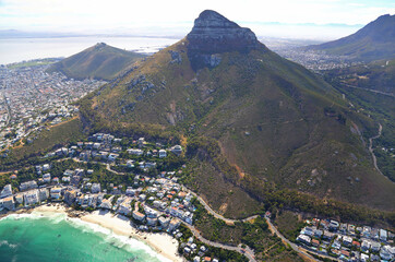 Cape Town, Western Cape / South Africa - 11/25/2016: Aerial photo of Clifton with Lions Head in the background
