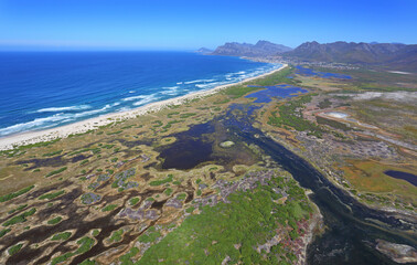 Cape Town, Western Cape / South Africa - 01/26/2017: Aerial photo of mountains surrounding Kleinmond and Bot River mouth