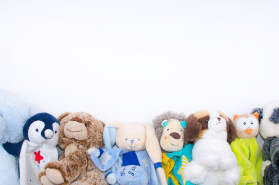 stuffed animals at the bottom of the picture. Space for text 