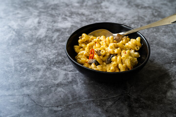 Mac and Cheese, American Style Macaroni Pasta with Cheesy Sauce and Crunchy Breadcrumbs Topping on.