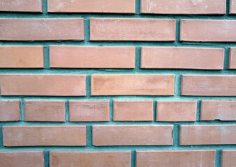 Obraz premium Red brick wall. Background of a brick wall. Brick texture
