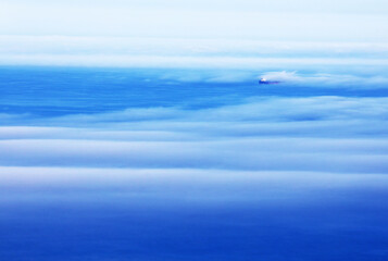 Cape Town, Western Cape / South Africa - 10/25/2018: Aerial photo of fog surrounding a vessel