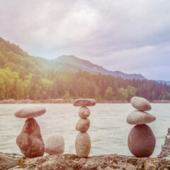 Sunset on the mountain river. Cloudy day. Stones.