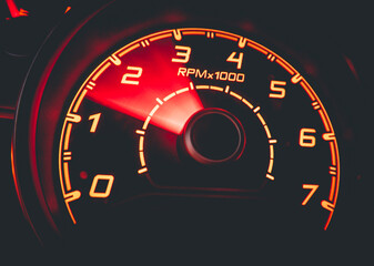 Driver's cockpit ; speedometer on dashboard - colorful light in black, copy space for your abstract...