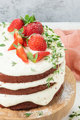 Red velvet cake on wood board. Strawbwrry cake. Devils cake. Wedding dessert. Birthday party. Delicious dessert. Traditional american dessert.