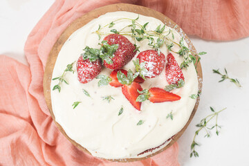 Red velvet cake on wood board. Strawbwrry cake. Devils cake. Wedding dessert. Birthday party. Delicious dessert. Traditional american dessert.