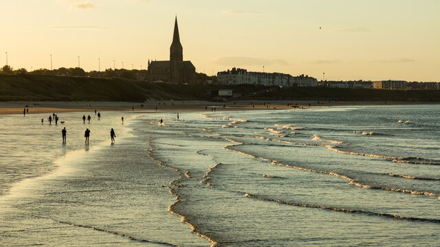 Sundown at Longsands Beach, Tynemouth on the north east coast of England, UK.