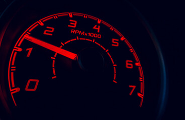 Driver's cockpit ; speedometer on dashboard - colorful light in black, copy space for your abstract...
