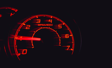 Driver's cockpit ; speedometer on dashboard - colorful light in black, copy space for your abstract...