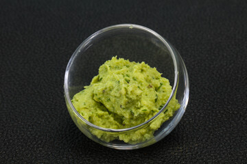Avocado guacamole sauce with chili pepper