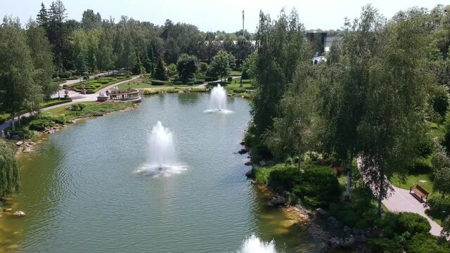 Aerial view, Mezhyhirya residence of the former president of Ukraine Viktor Yanukovych. Beautiful lakes with fountains. Drone
