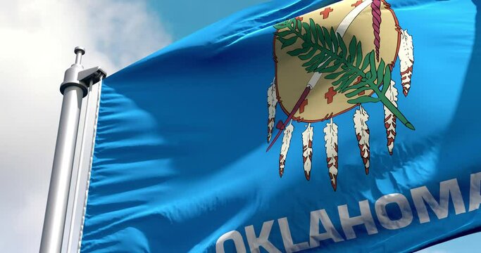 Oklahoma flag on a flagpole waving in the wind in the sky. Wonderful intro for yor projects. State of Oklahoma in The United States of America. Oklahoma City.