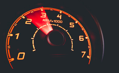 Fototapeta premium Driver's cockpit ; speedometer on dashboard - colorful light in black, copy space for your abstract design 