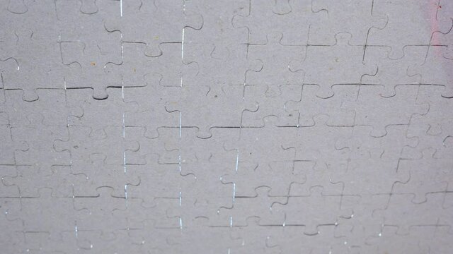 Putting the last piece of jigsaw puzzle to complete the mission. Puzzle piece coming down into it's place. Business concept for key completion for business success