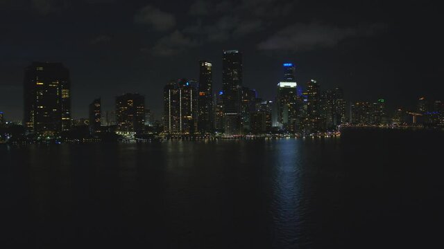 Night aerial Brickell Miami large group of buildings on the bay