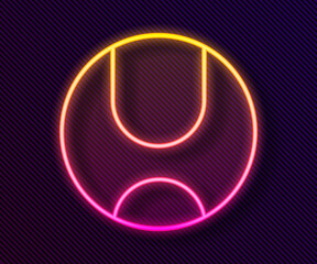 Glowing neon line Tennis ball icon isolated on black background. Sport equipment.  Vector Illustration