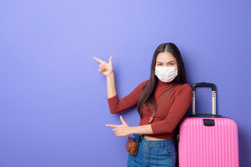 portrait of young traveler woman with face mask , New normal travel concept