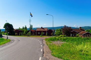 A sunny summer morning around lake Siljan with forests and rolling hills in beautiful Dalarna,Sweden