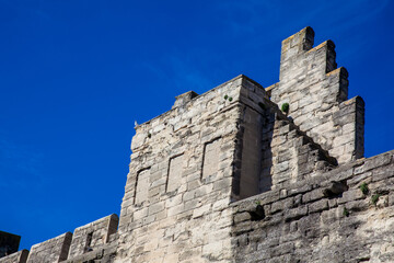 Medieval built Avignon city stone wall at French Provence