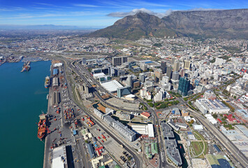 Cape Town, Western Cape / South Africa - 04/26/2019: Aerial photo of Table Bay Harbour and CBD with Table Mountain in the background